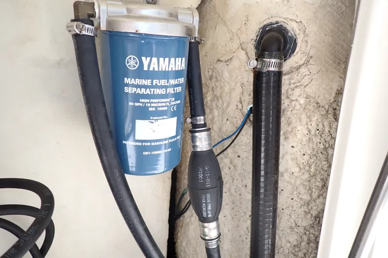 Slide: The Image of Yamaha marine fuel/water separator filter on 2019 Sailfish 245 DC boat. - 74