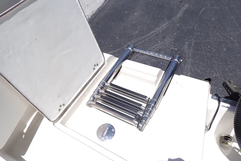 Slide: The Image of Stainless steel boat ladder on 2019 Sailfish 245 DC deck. - 82