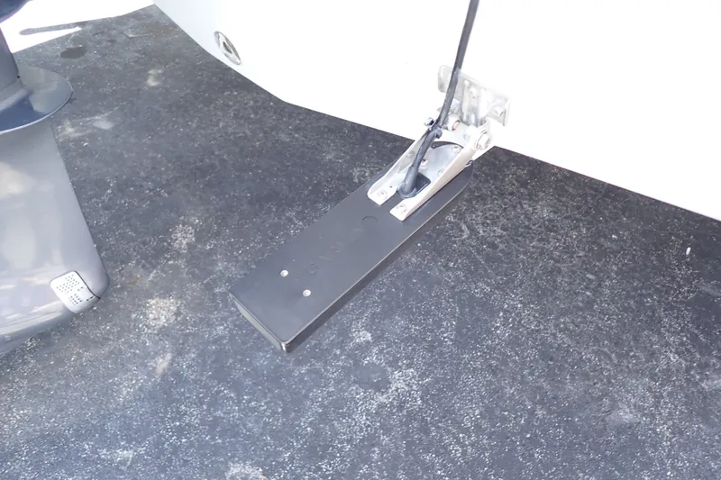 Slide: The Image of Transom-mounted equipment on 2019 Sailfish 245 DC boat, featuring a sleek design. - 131