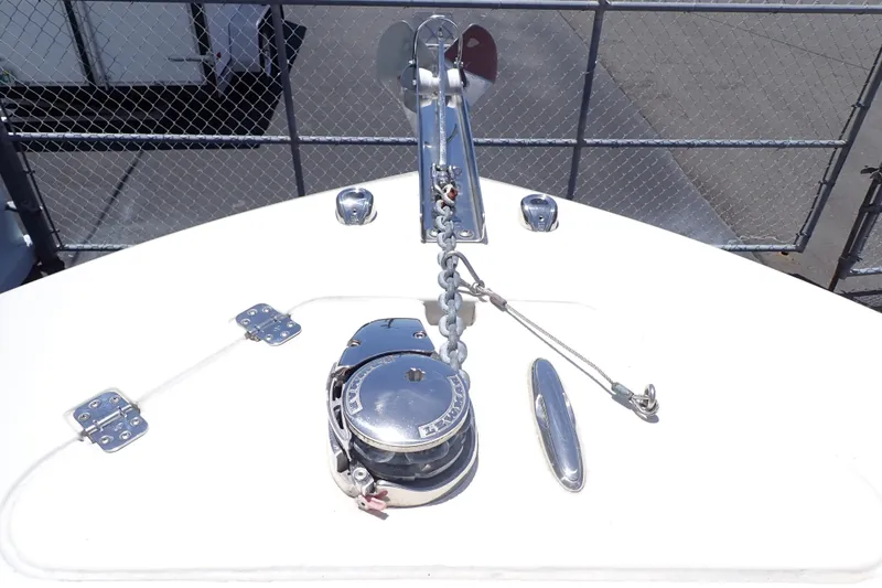Slide: The Image of Bow of 2019 Sailfish 245 DC boat with anchor and winch system. - 16