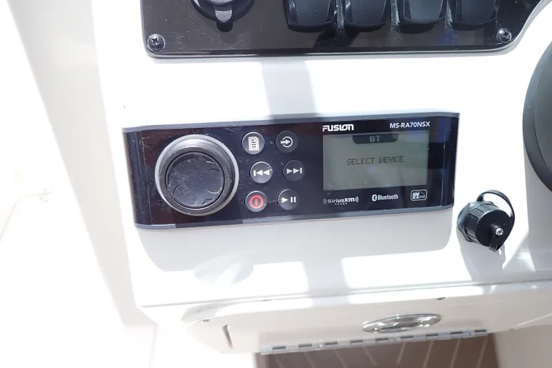 Slide: The Image of Fusion MS-RA70NSX stereo system on 2019 Sailfish 245 DC boat dashboard. - 26
