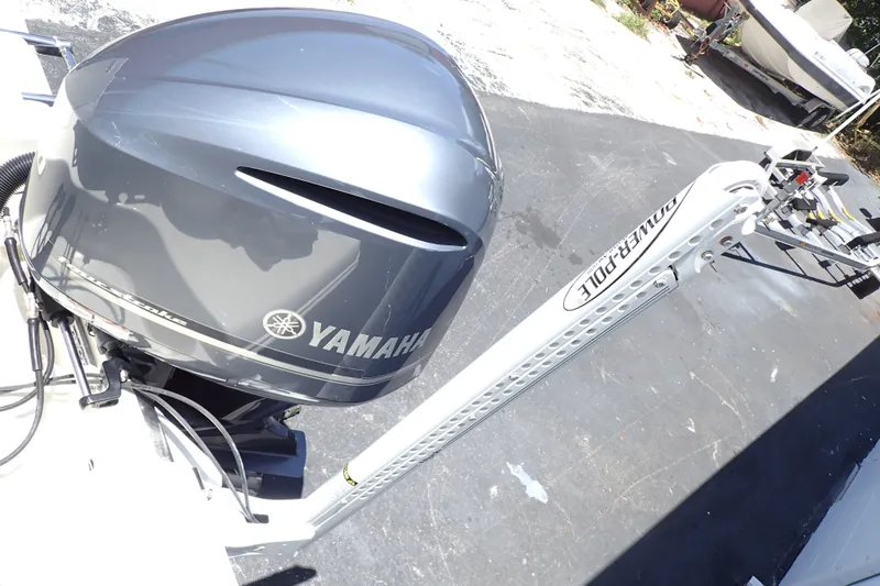 Slide: The Image of 2019 Sailfish 245 DC boat with Yamaha outboard motor and Power-Pole anchor system. - 80