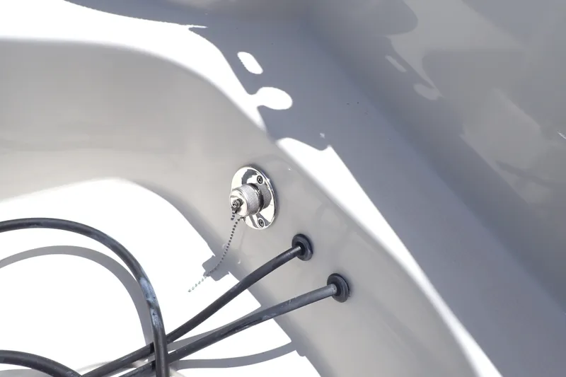 Slide: The Image of 2019 Sailfish 245 DC boat interior detail with cables and metal fitting. - 83