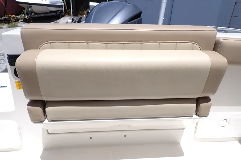 Slide: The Image of Beige seating on 2019 Sailfish 245 DC boat, showcasing comfortable marine upholstery. - 69