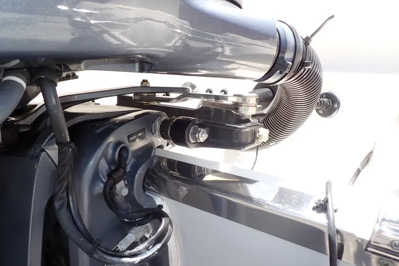 Slide: The Image of Close-up of 2019 Sailfish 245 DC boat engine components and wiring. - 114