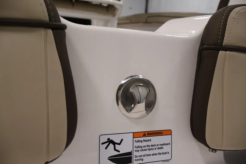 Slide: The Image of 2026 Yamaha Boats 252 FSH Sport interior detail with safety warning label. - 46