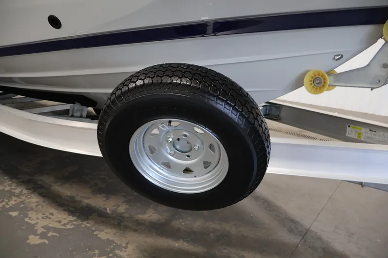 Slide: The Image of Trailer wheel of 2026 Yamaha Boats 252 FSH Sport, close-up view. - 50