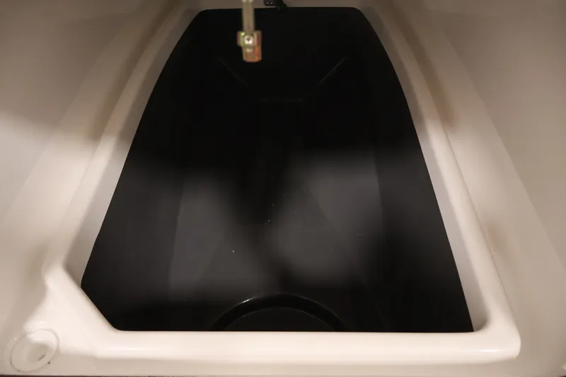 Slide: The Image of Storage compartment of 2026 Yamaha Boats 252 FSH Sport, featuring sleek interior design. - 15