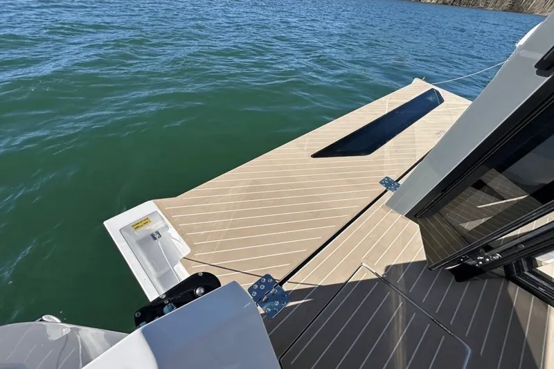 Slide: The Image of 2025 Saxdor 400 GTC boat deck with open water view. - 15