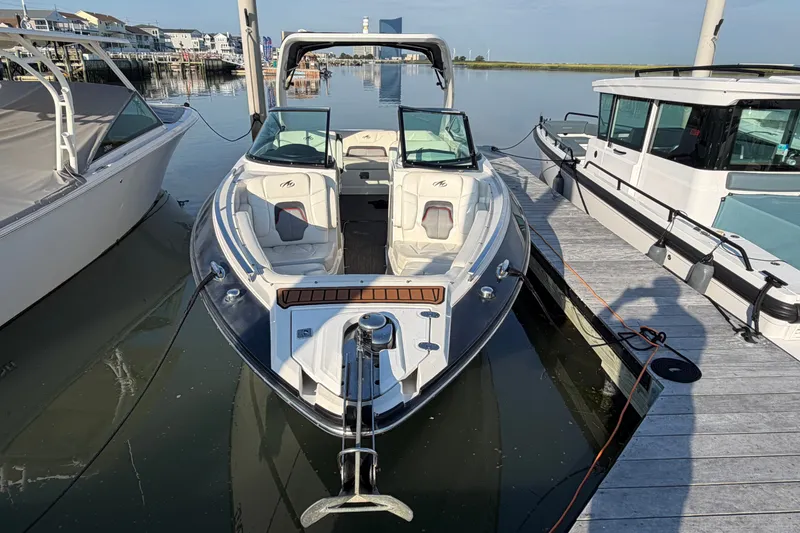 Slide: The Image of 2014 Monterey 288SS Super Sport boat docked at marina, front view. - 1