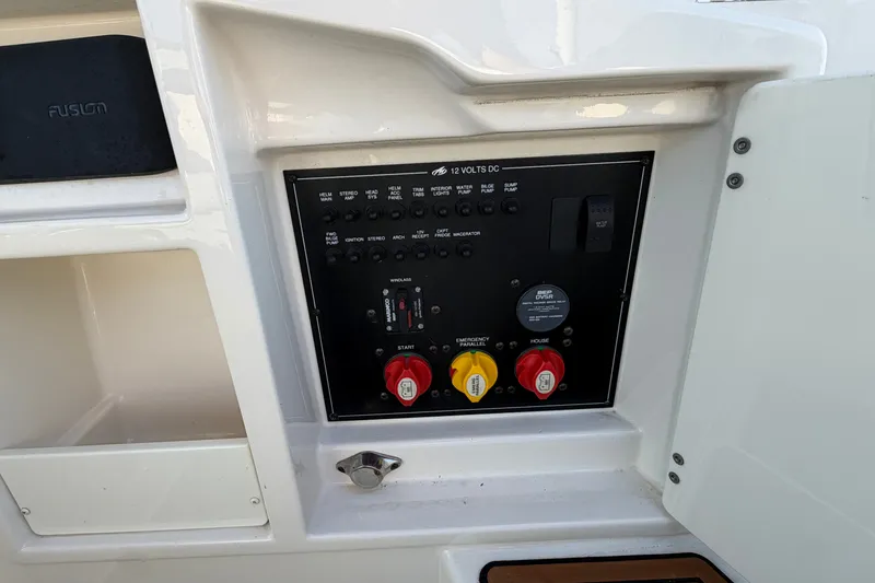 Slide: The Image of Control panel of a 2014 Monterey 288SS Super Sport boat with switches and dials. - 21