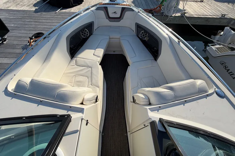 Slide: The Image of 2014 Monterey 288SS Super Sport boat interior with white seating and sleek design. - 3