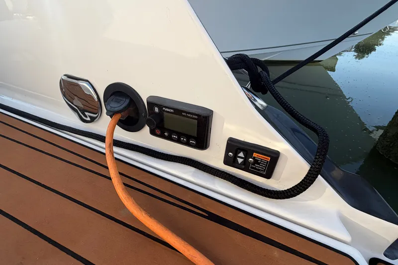 Slide: The Image of 2014 Monterey 288SS Super Sport boat with power connection and control panel. - 27