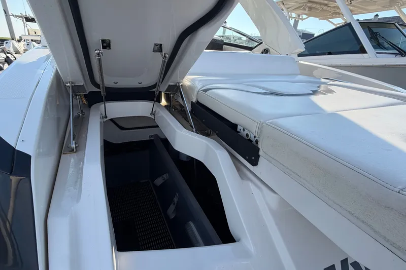 Slide: The Image of Open storage compartment on a 2014 Monterey 288SS Super Sport boat. - 30