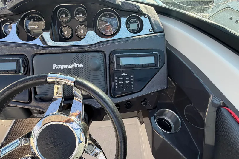 Slide: The Image of Dashboard of 2014 Monterey 288SS Super Sport boat with Raymarine equipment. - 14