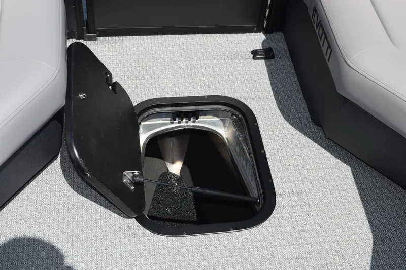 Slide: The Image of Open storage compartment on 2026 Evotti 523QL boat with patterned flooring. - 21
