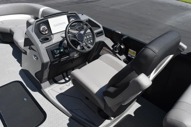 Slide: The Image of Cockpit of 2026 Evotti 523QL boat with Garmin navigation system and modern steering controls. - 10