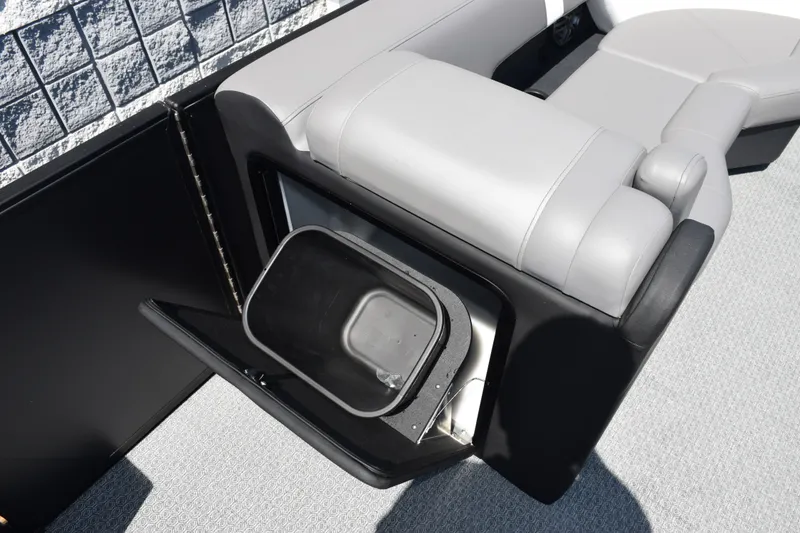 Slide: The Image of Evotti 523QL 2026 model boat interior with open storage compartment and seating. - 20