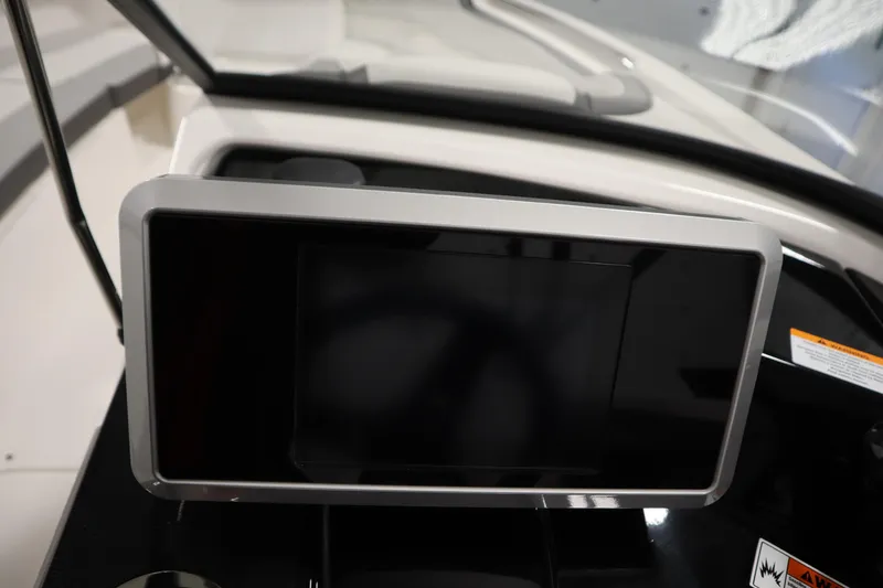 Slide: The Image of 2026 Yamaha AR250 boat dashboard with modern touchscreen display. - 19