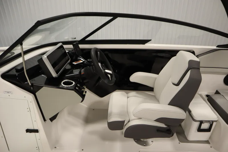 Slide: The Image of 2026 Yamaha Boats AR250 cockpit with modern steering and comfortable seating. - 16