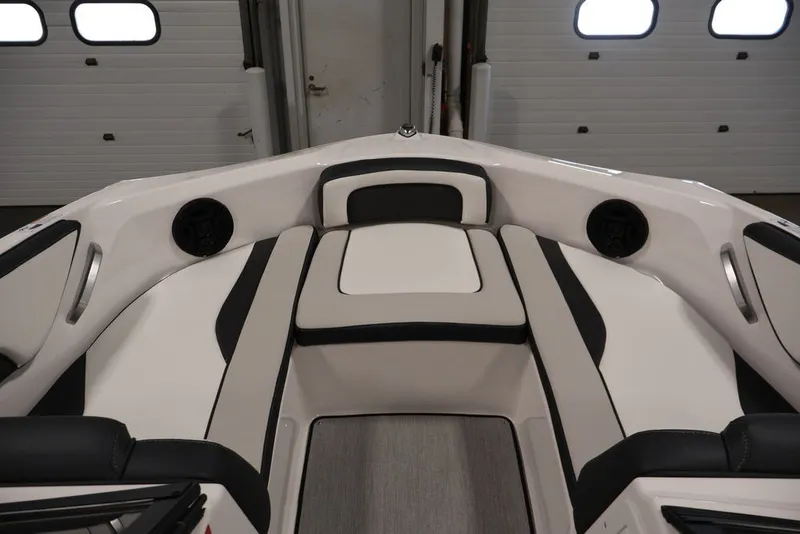 Slide: The Image of 2026 Yamaha Boats AR195 interior with sleek black and white seating design. - 16