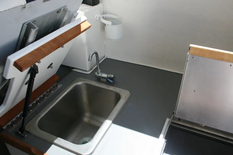 Slide: The Image of 2007 Sea Sport 2200 Sportsman boat interior with sink and faucet. - 6