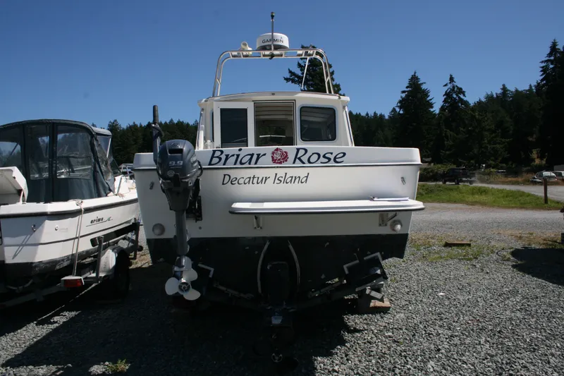 Slide: The Image of 2007 Sea Sport 2200 Sportsman boat named "Briar Rose" at Decatur Island dock. - 12