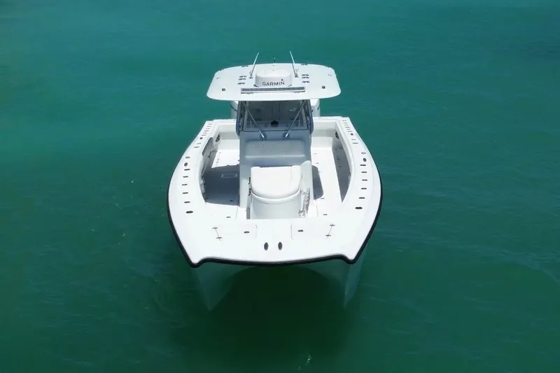 Slide: The Image of Freeman 34VH 2022 boat on clear turquoise water, aerial view. - 5