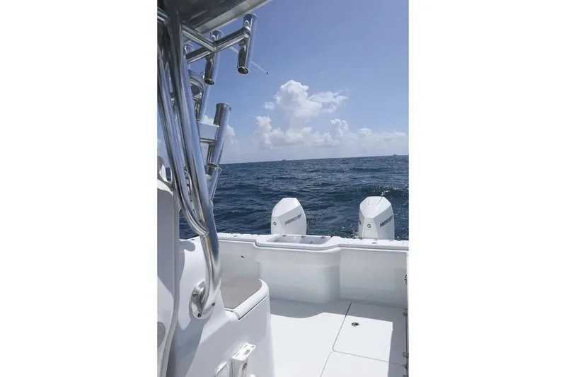 Slide: The Image of 2022 Freeman 34VH boat with dual Mercury engines on open sea. - 21
