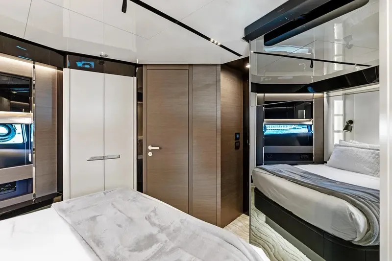 Slide: The Image of Luxurious interior of 2024 Azimut S8 yacht featuring modern bedroom design. - 36