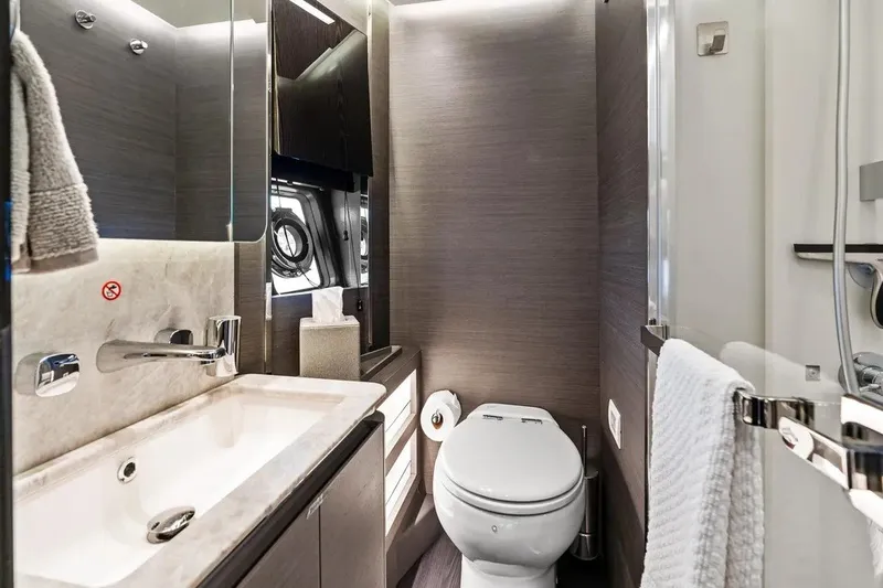Slide: The Image of Luxurious bathroom in 2024 Azimut S8 yacht with modern fixtures and elegant design. - 30