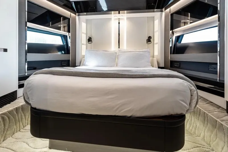 Slide: The Image of Luxurious bedroom interior of 2024 Azimut S8 yacht with modern design and cozy bedding. - 35