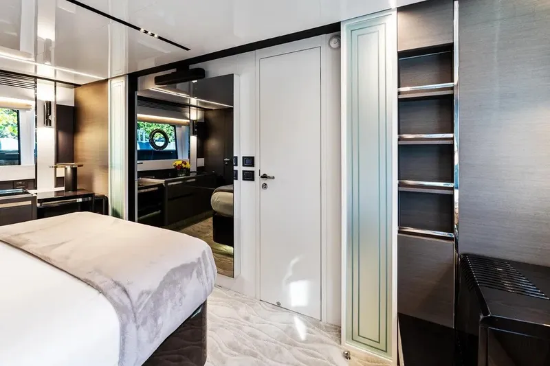 Slide: The Image of Luxurious interior of 2024 Azimut S8 yacht bedroom with modern design elements. - 19
