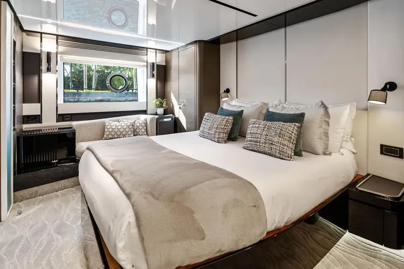 Slide: The Image of Luxurious bedroom interior of 2024 Azimut S8 yacht with elegant decor and modern amenities. - 14