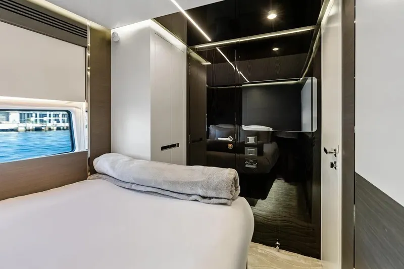 Slide: The Image of Luxurious bedroom interior of 2024 Azimut S8 yacht with modern design and waterfront view. - 29