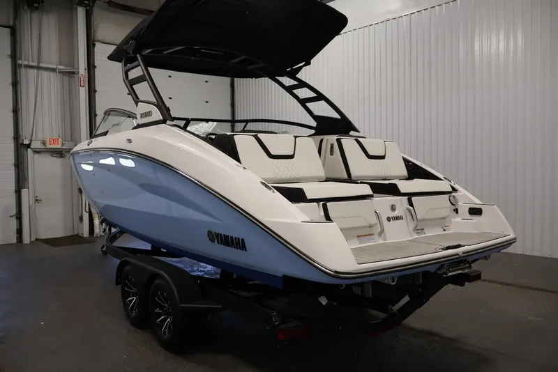 Slide: The Image of 2026 Yamaha Boats 252SD in showroom, featuring sleek design and modern amenities. - 18