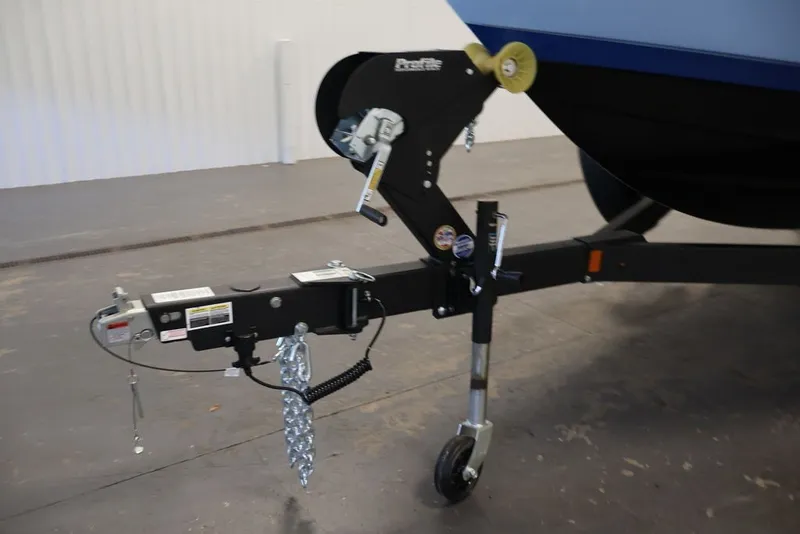 Slide: The Image of Trailer hitch of 2026 Yamaha Boats 252SD, featuring a sturdy wheel and secure attachments. - 27