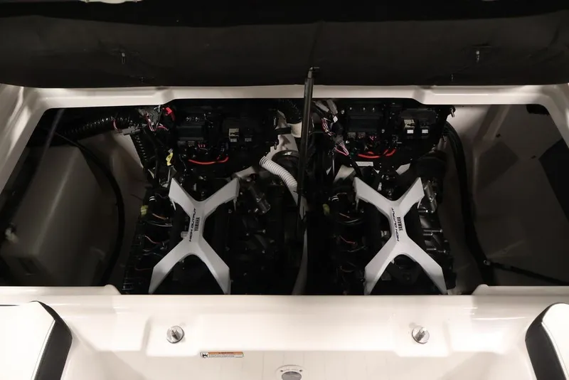 Slide: The Image of Engine compartment of 2026 Yamaha Boats 252SD, showcasing dual engines and components. - 31