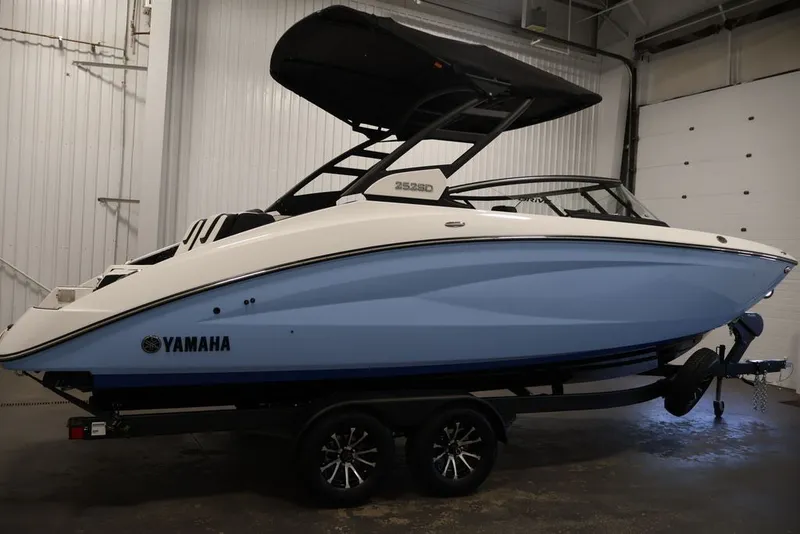 Slide: The Image of 2026 Yamaha Boats 252SD in a showroom, featuring sleek design and modern features. - 45