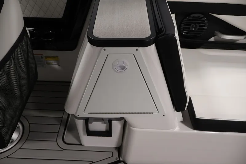 Slide: The Image of 2026 Yamaha Boats 252SD interior detail with seating and storage compartment. - 38