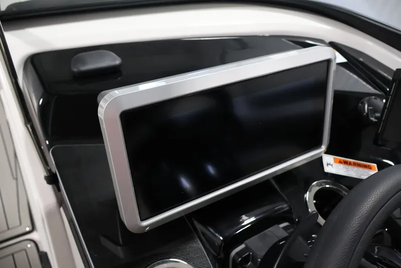 Slide: The Image of 2026 Yamaha Boats 252SD dashboard with large touchscreen display and modern controls. - 26