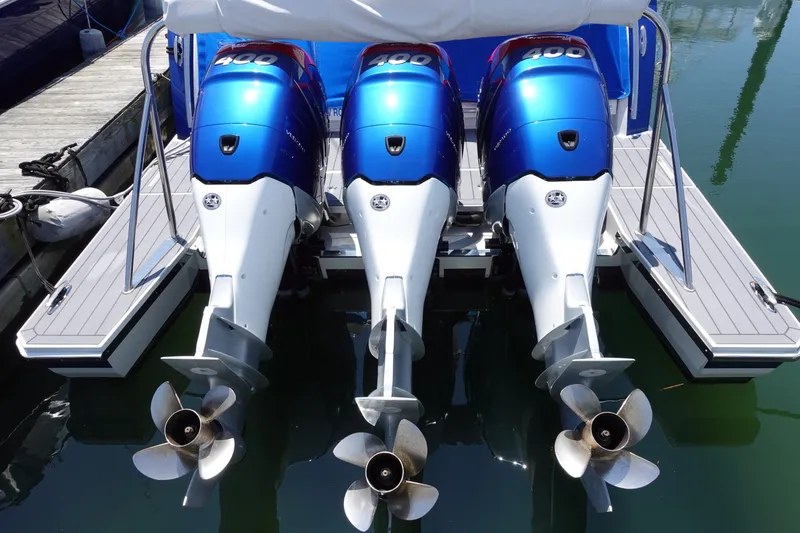 Slide: The Image of Triple outboard motors on a 2022 Formula 380 Super Sport Crossover OB boat. - 5