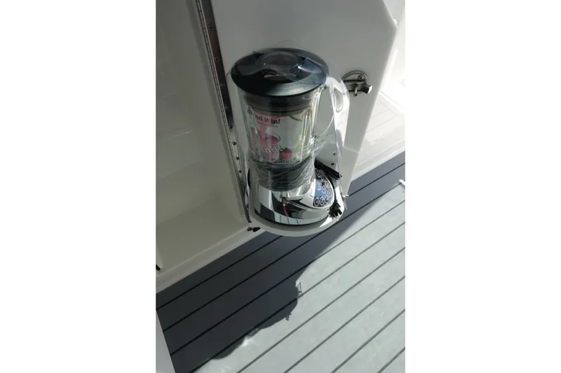 Slide: The Image of 2022 Formula 380 Super Sport Crossover OB boat with built-in blender on deck. - 15