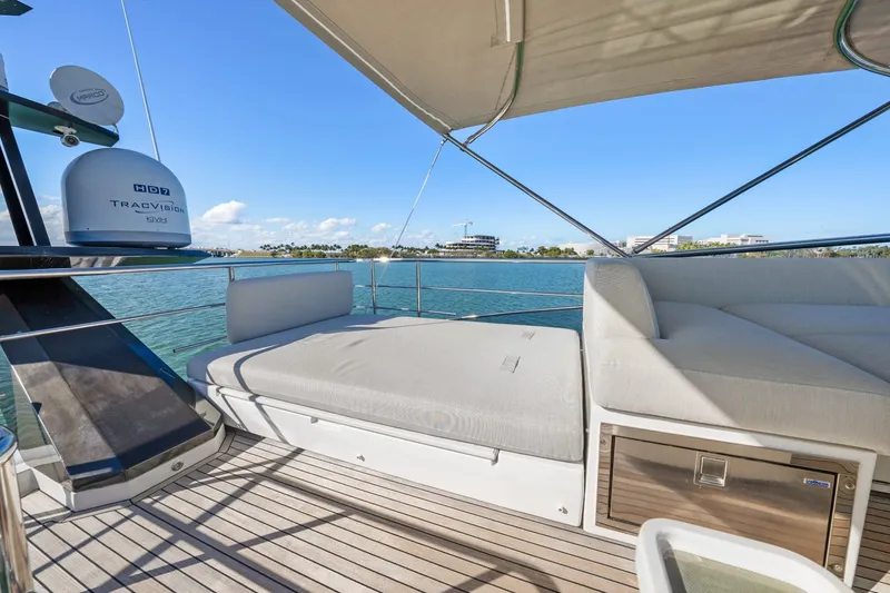 Slide: The Image of Luxurious 2018 Azimut S7 yacht deck with comfortable seating and scenic ocean view. - 16