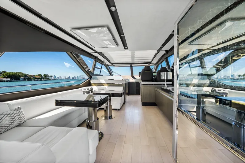 Slide: The Image of Luxurious interior of 2018 Azimut S7 yacht with panoramic windows and modern furnishings. - 19