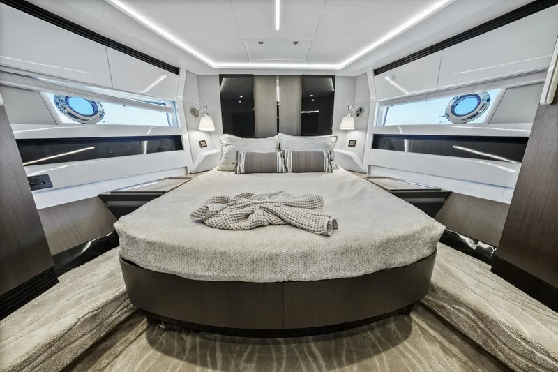 Slide: The Image of Luxurious bedroom interior of 2018 Azimut S7 yacht with modern design and elegant bedding. - 11