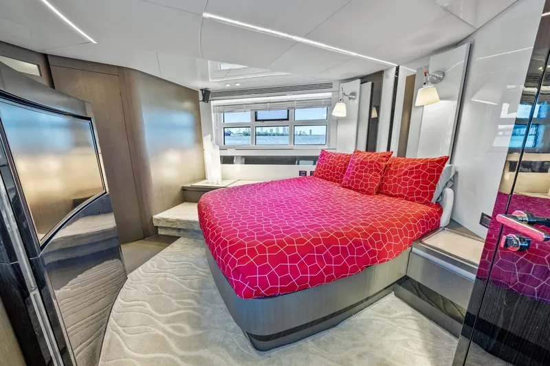 Slide: The Image of Luxurious bedroom interior of 2018 Azimut S7 yacht with modern design and vibrant red bedding. - 44