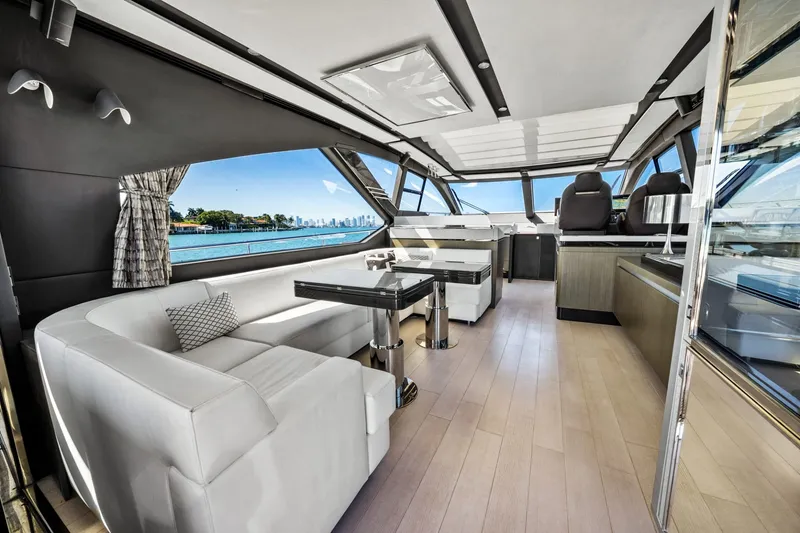 Slide: The Image of Luxurious interior of 2018 Azimut S7 yacht with modern seating and panoramic windows. - 39