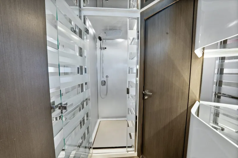 Slide: The Image of Modern shower area in 2018 Azimut S7 yacht with glass door and sleek design. - 6
