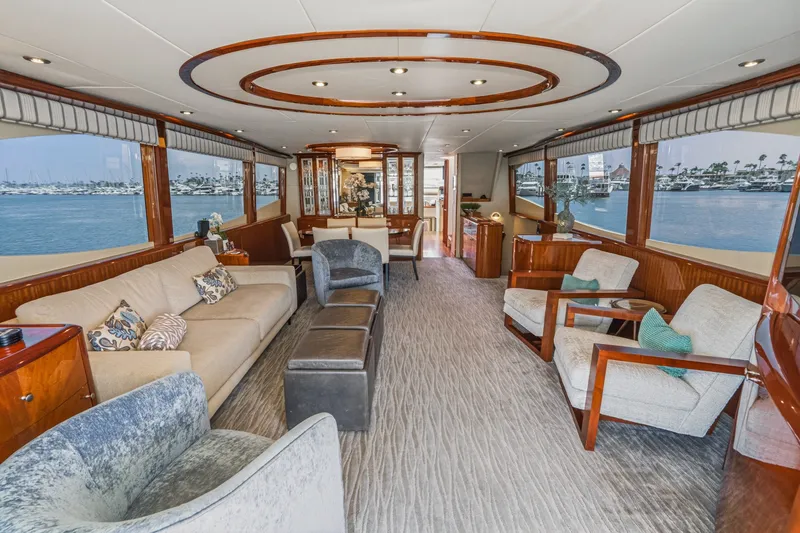Slide: The Image of Luxurious interior of 2006 Lazzara 84 Flybridge yacht with elegant seating and panoramic windows. - 41